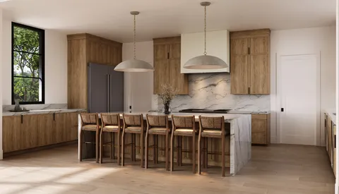 a kitchen with a table and chairs in it