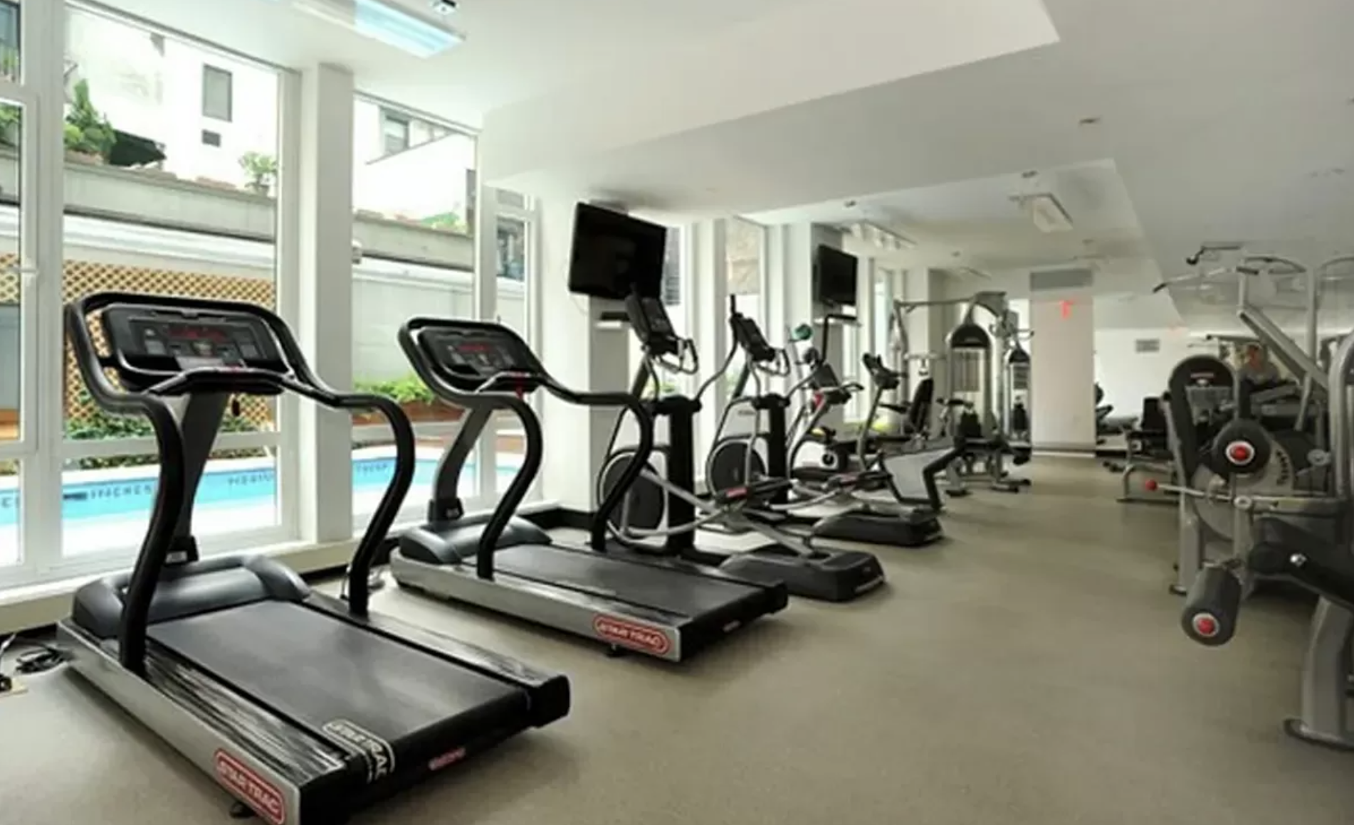 133 West 22nd Street, Unit 7H Manhattan, NY 10011 - Photo 16 of 22 a view of a room with gym equipment