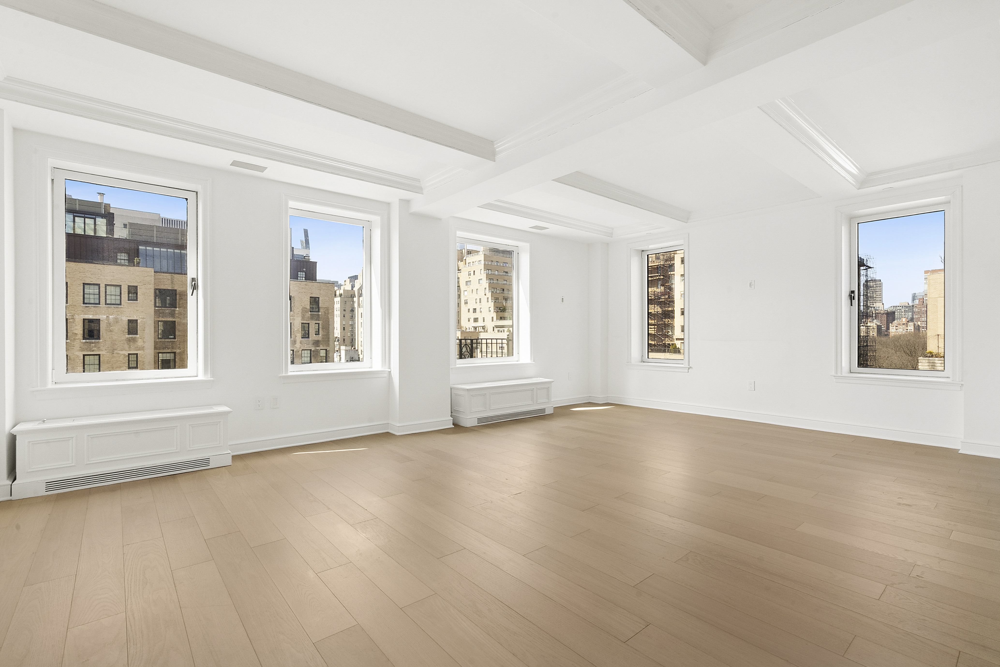 15 East 69th Street, Unit 10D Manhattan, NY 10021 - Photo 3 of 12 a view of an empty room with window