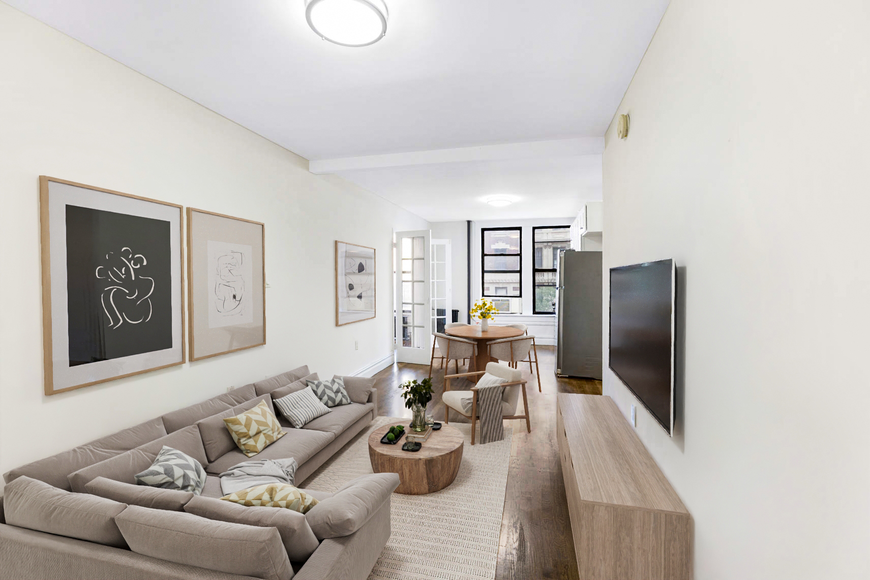 24 East 97th Street, Unit 10 Manhattan, NY 10128 - Photo 1 of 7 a living room with furniture and a flat screen tv