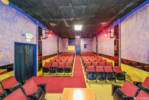 a room with furniture and a rug