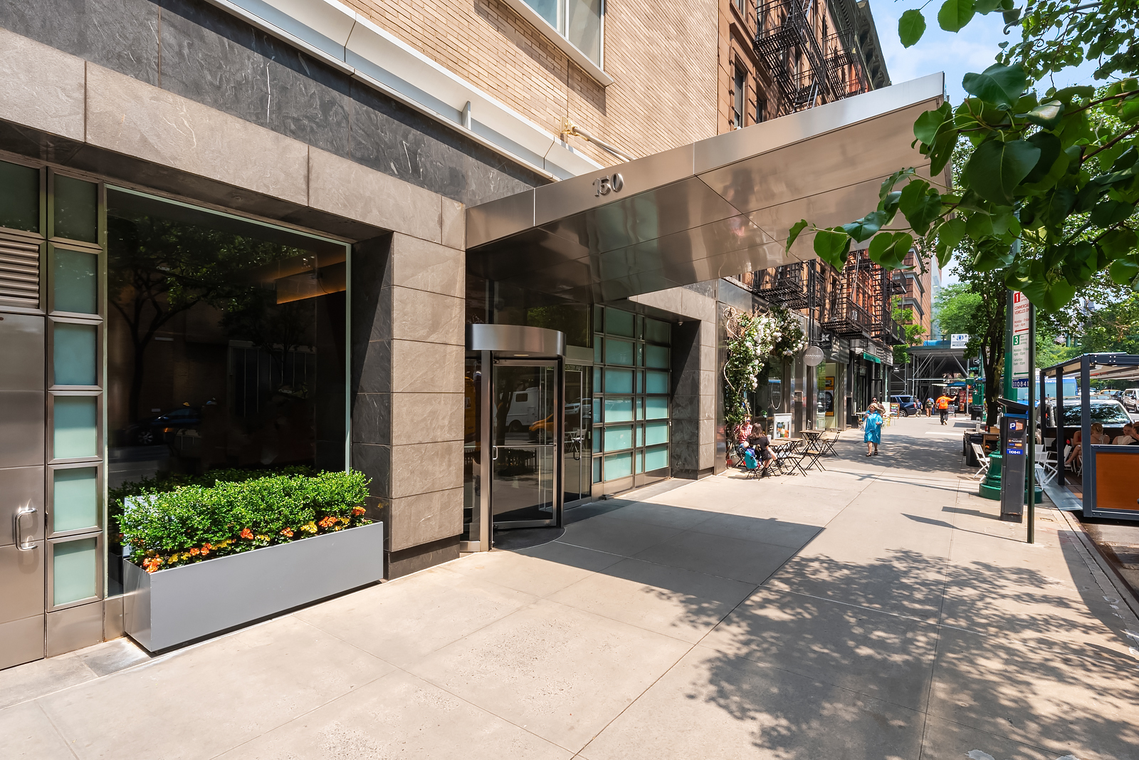 150 Columbus Avenue, Unit 22A Manhattan, NY 10023 - Photo 21 of 23 a view of a street with sitting area