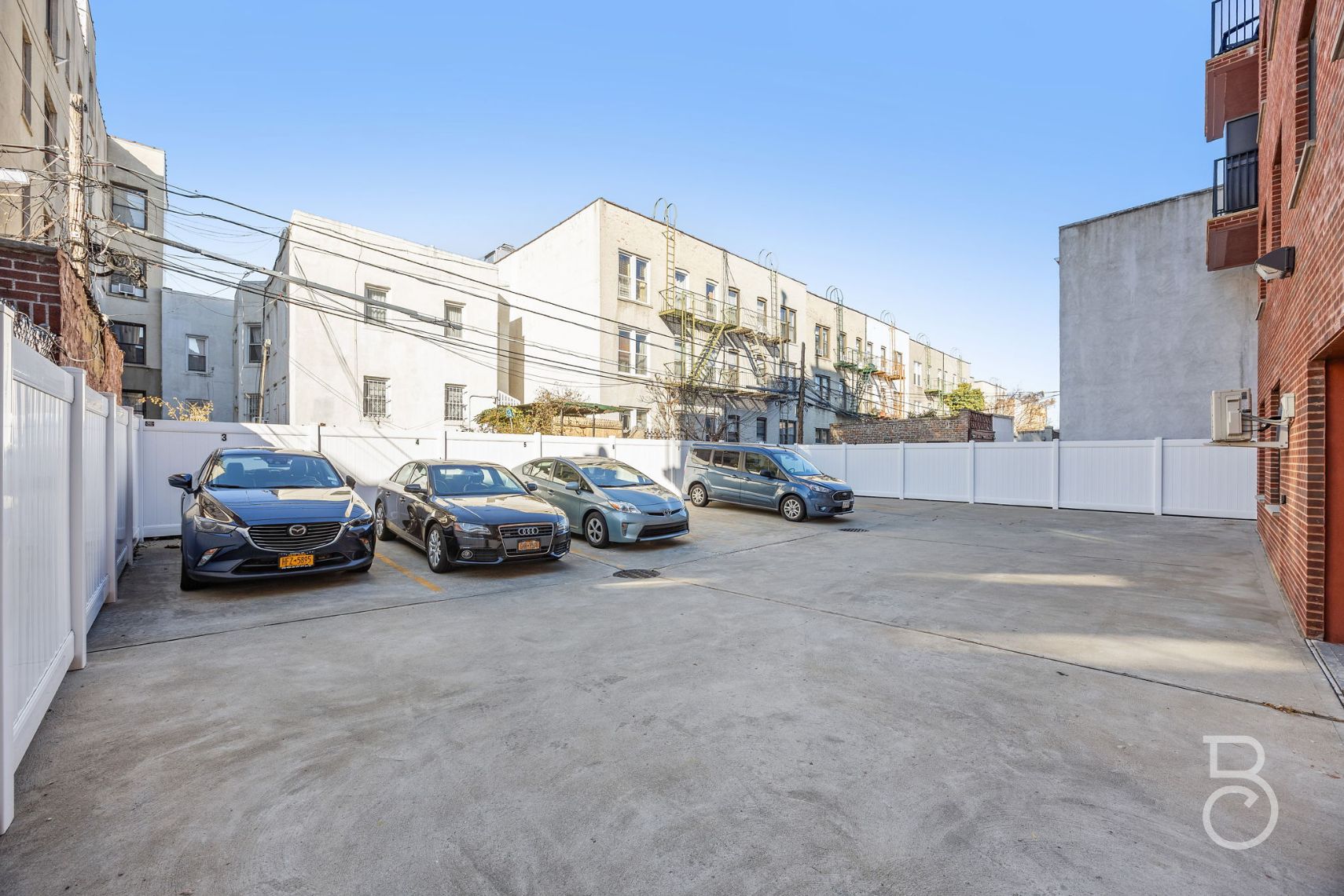 25-74 34th Street, Unit 4C Queens, NY 11103 - Photo 13 of 15 a view of a cars parked in front of a building
