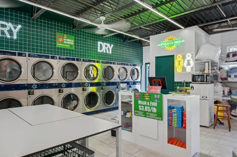 a view of a shop in a street