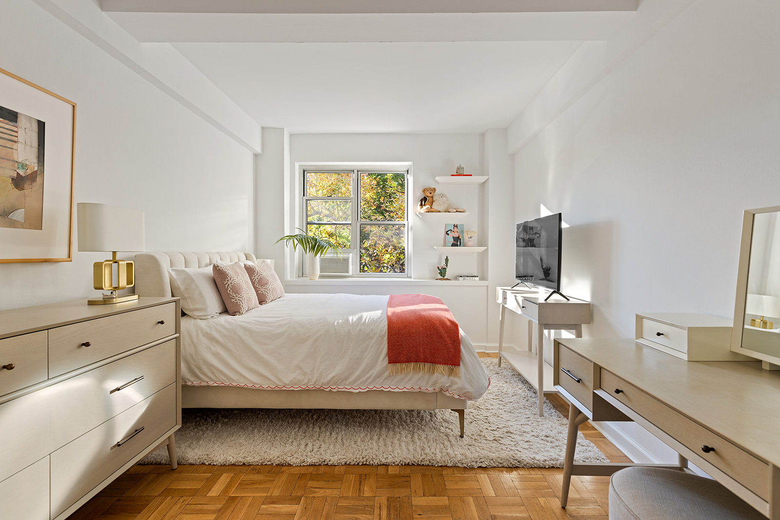 550 Grand Street, Unit G3E Manhattan, NY 10002 - Photo 4 of 7 a bedroom with a bed and large windows