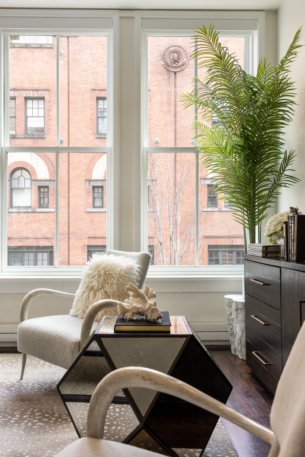 52 Laight Street, Unit R2 Manhattan, NY 10013 - Photo 17 of 21 a living room with furniture and a large window