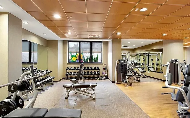 330 East 38th Street, Unit 20E Manhattan, NY 10016 - Photo 14 of 17 a view of a room with gym equipment
