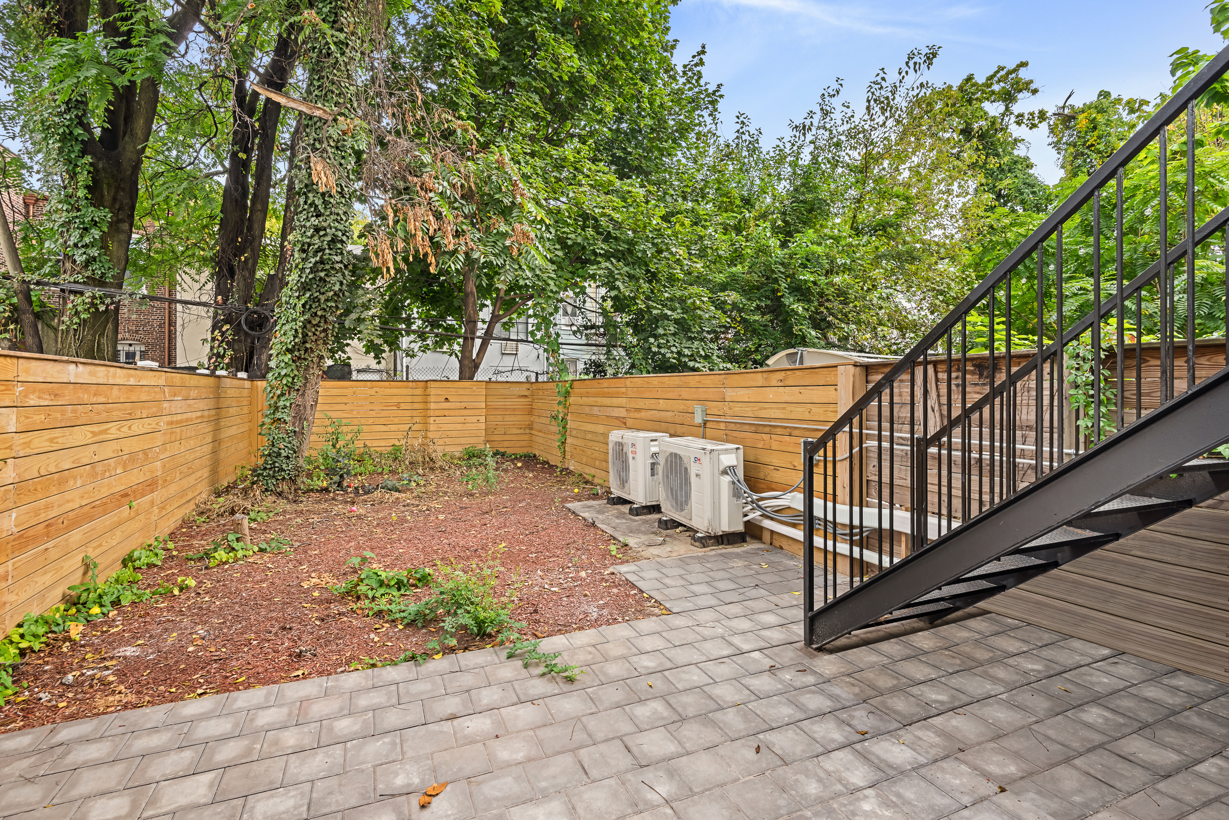 608 Van Buren Street Brooklyn, NY 11221 - Photo 8 of 10 a view of a backyard