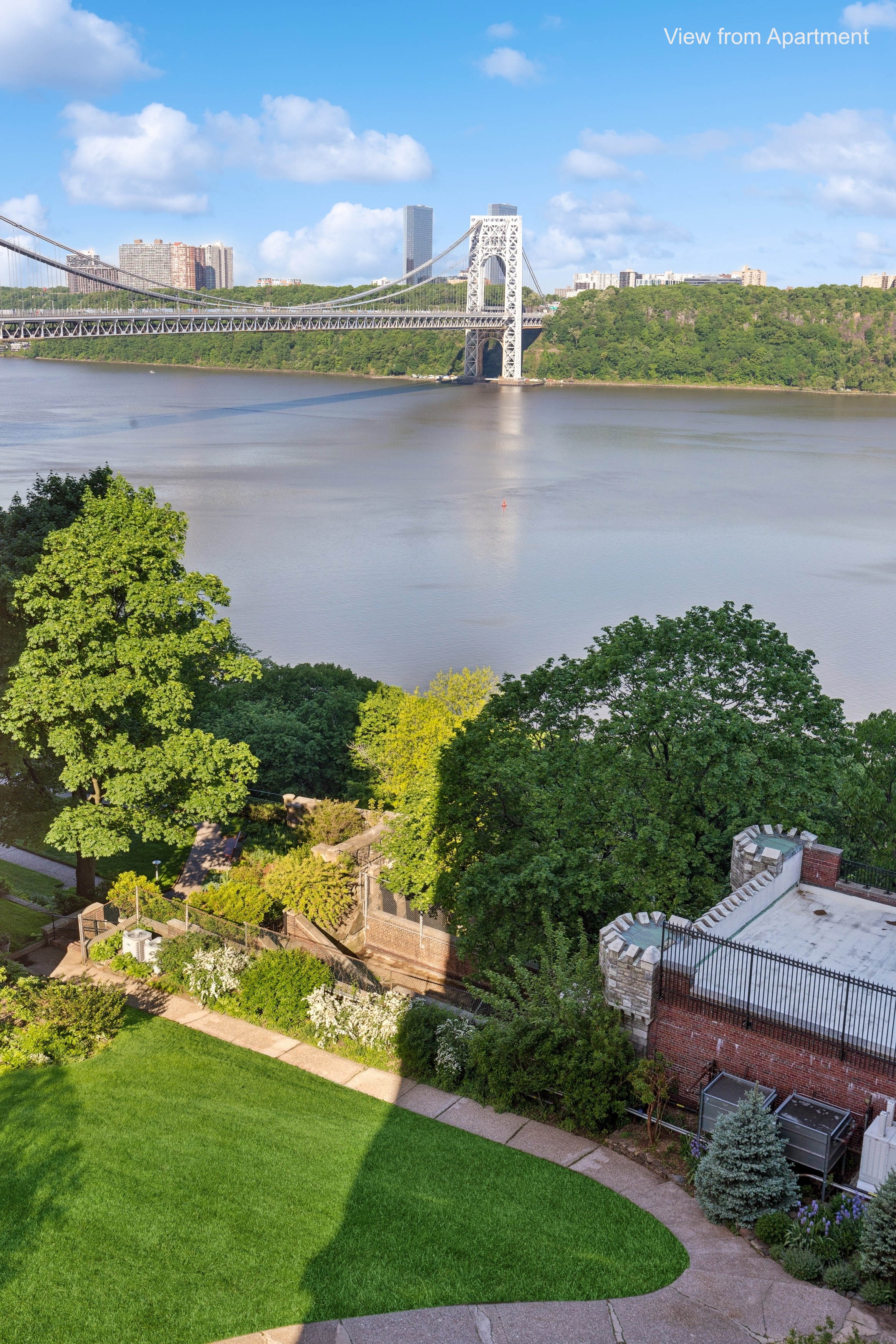 180 Cabrini Boulevard, Unit 54 Manhattan, NY 10033 - Photo 2 of 23 a view of a lake with a yard