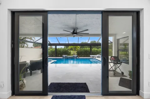 a view of swimming pool with a outdoor seating