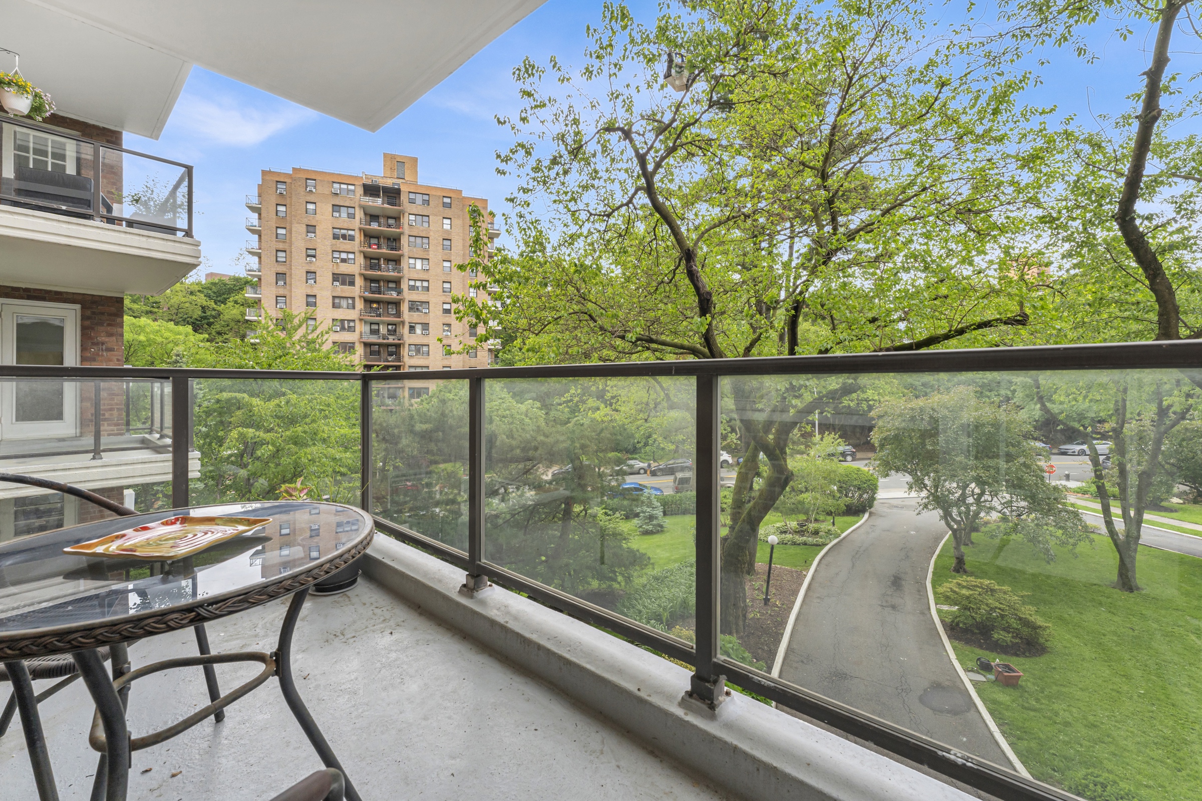 750 Kappock Street, Unit 307 Bronx, NY 10463 - Photo 13 of 20 a view of a chairs and table in patio