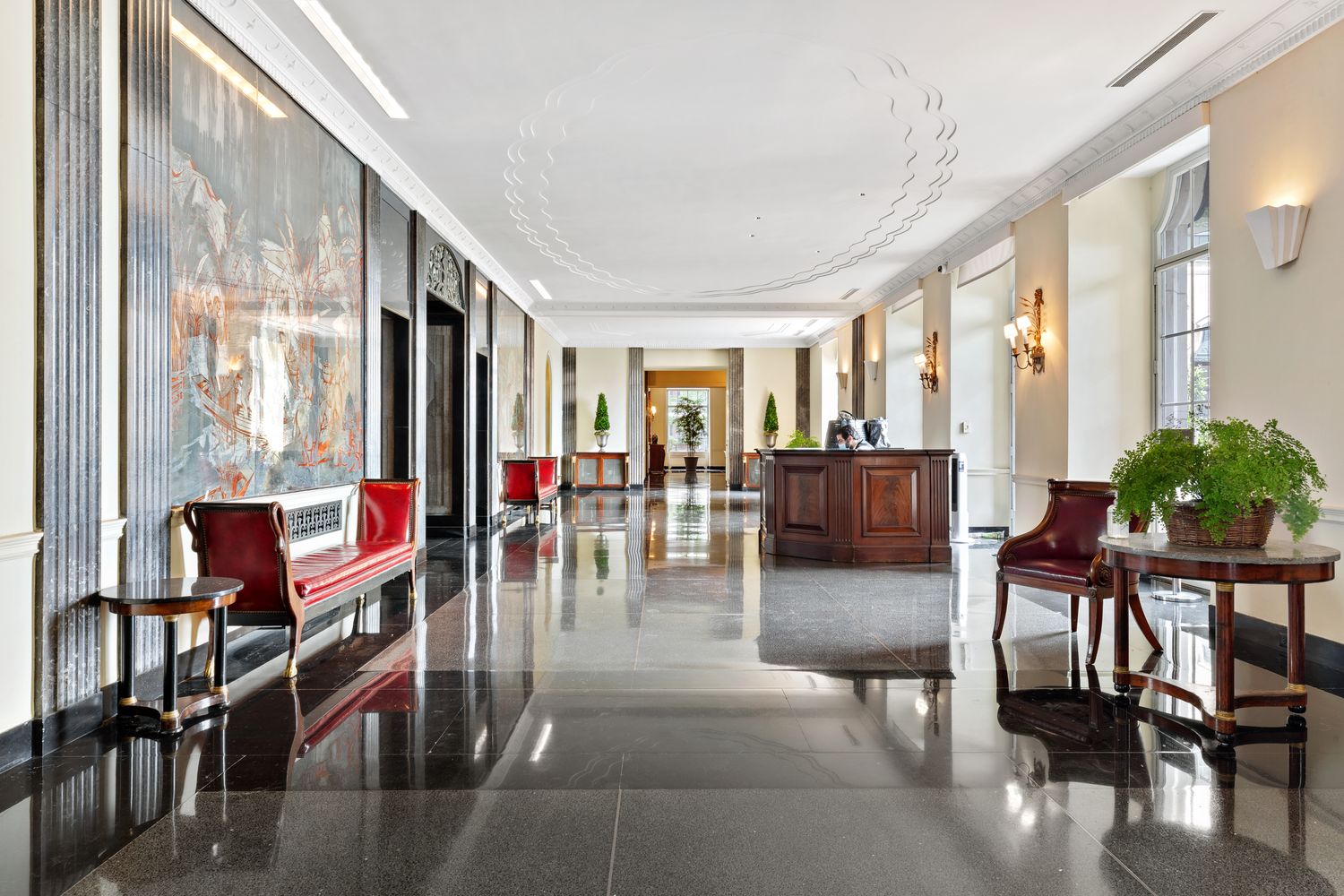 435 East 52nd Street, Unit 11A Manhattan, NY 10022 - Photo 18 of 21 a living room filled with furniture and a large window