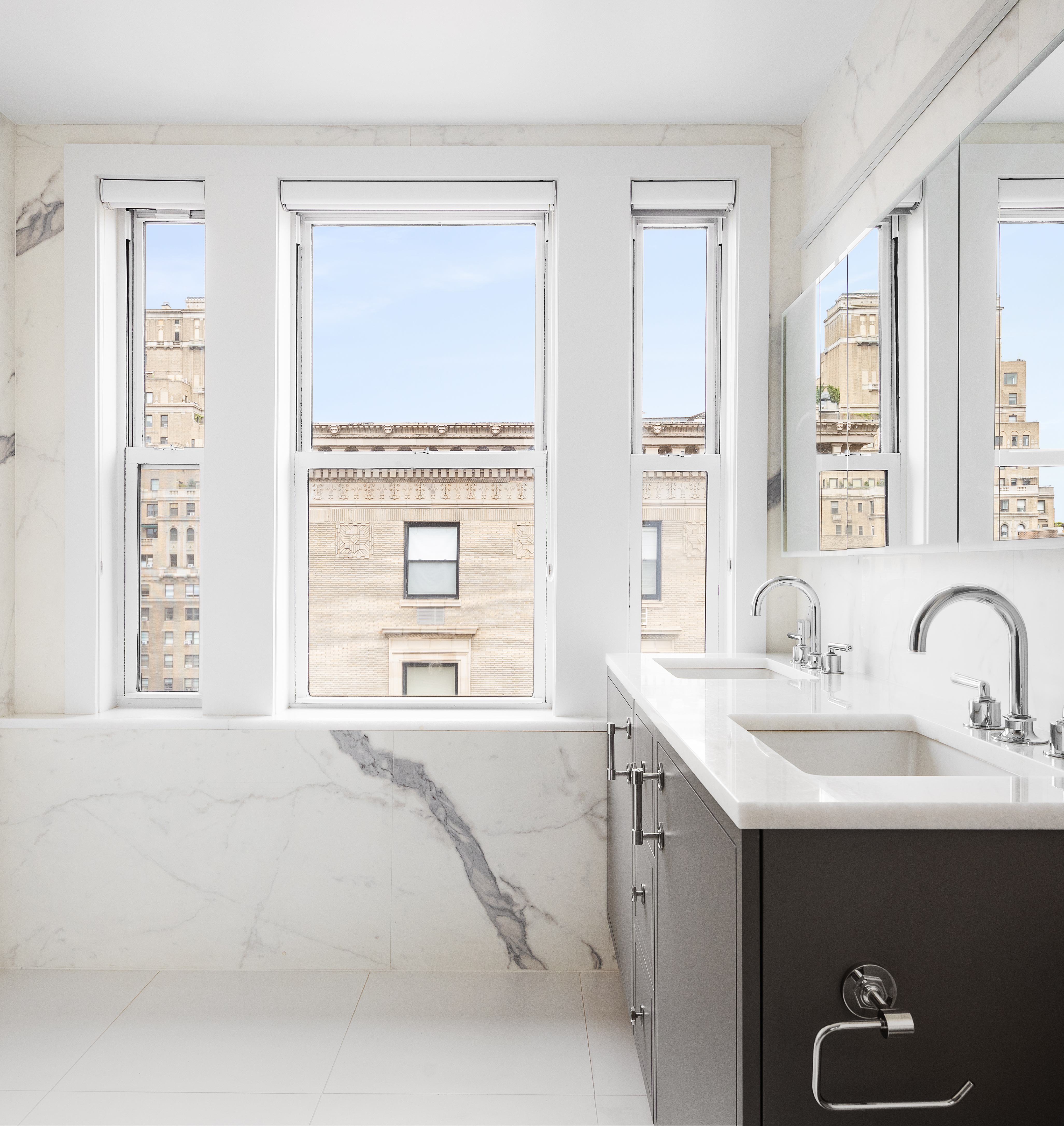 240 West End Avenue, Unit PH Manhattan, NY 10023 - Photo 9 of 25 a en suite bathroom with a sink double vanity and a window