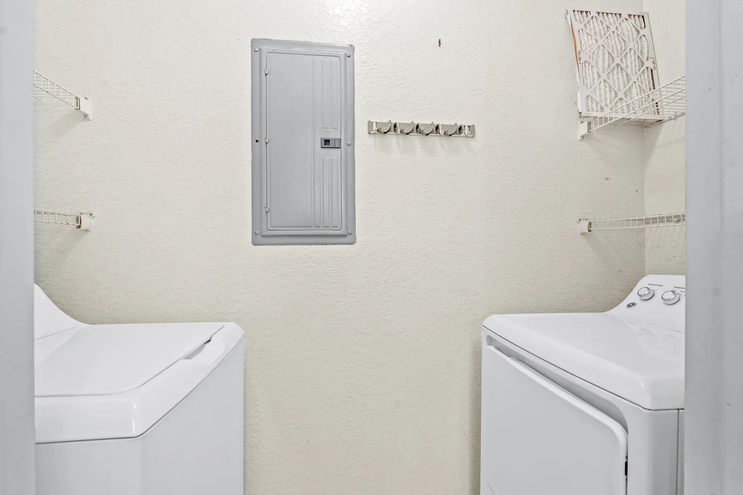 a house view with a garden space