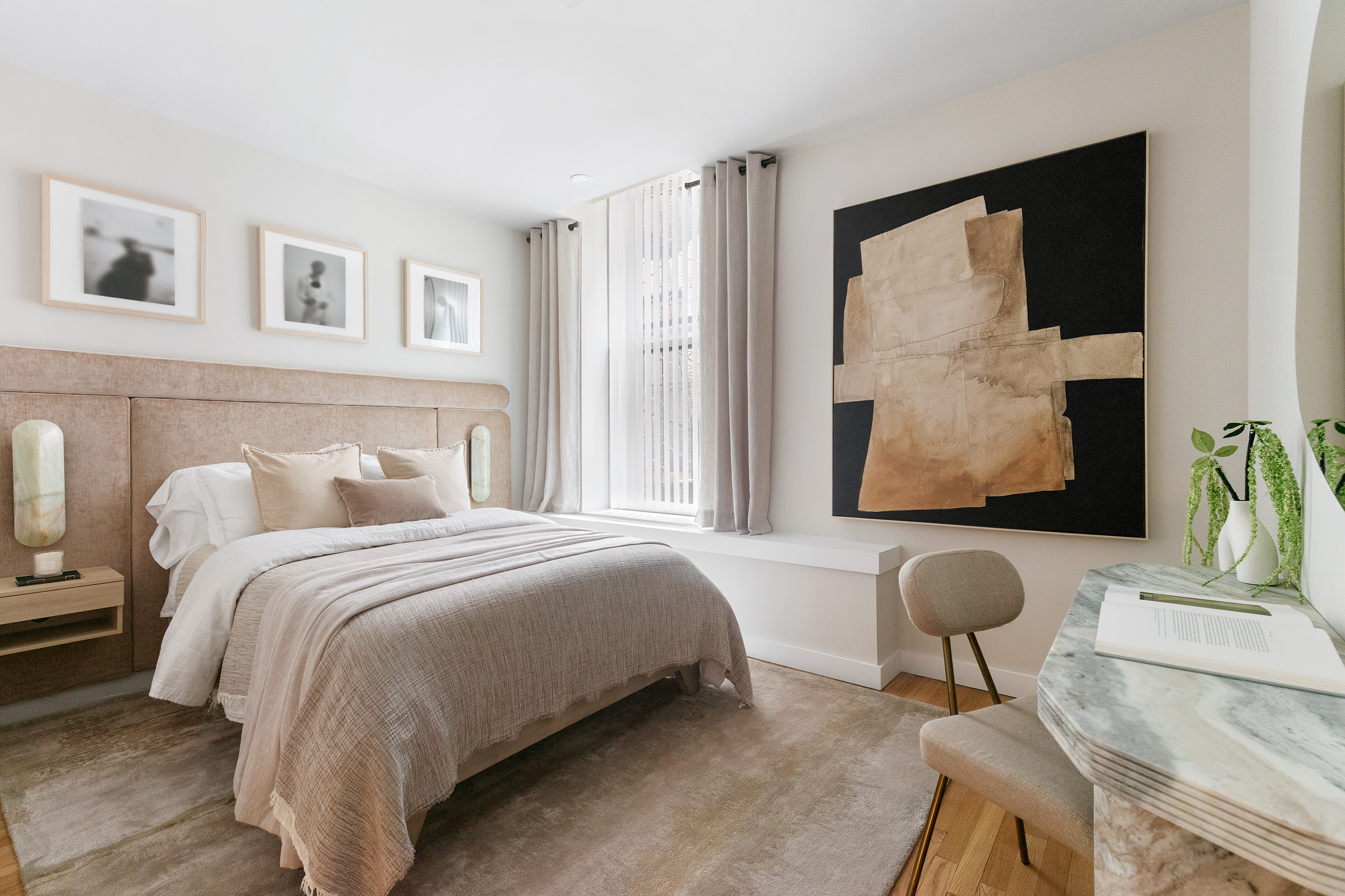 76 Crosby Street, Unit 2A Manhattan, NY 10012 - Photo 10 of 12 a bedroom with a bed and a painting on the wall