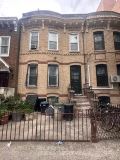 a front view of a house with balcony