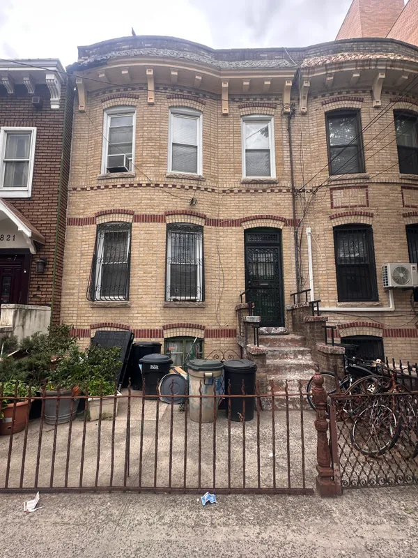 a front view of a house with balcony