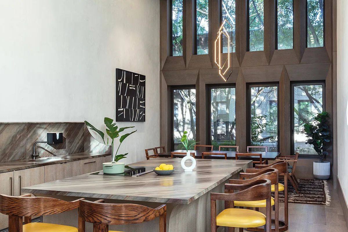 a view of a living room and dining room