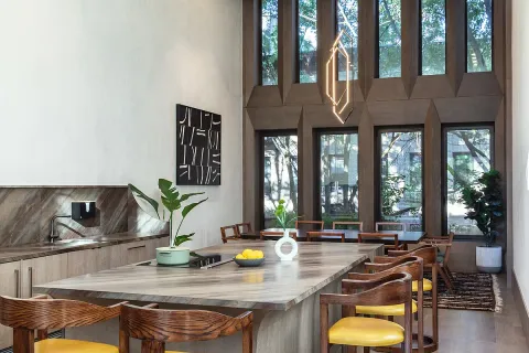 a view of a living room and dining room