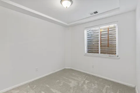 a bathroom with a sink mirror toilet and shower