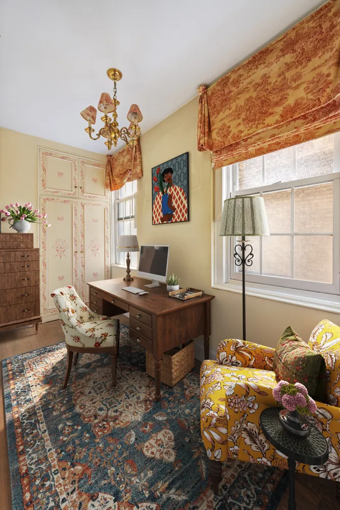 a living room with hard wood furniture