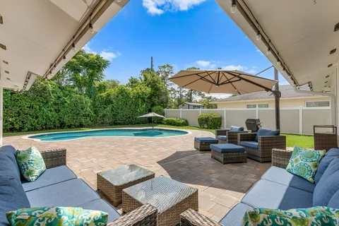 a view of a house with swimming pool