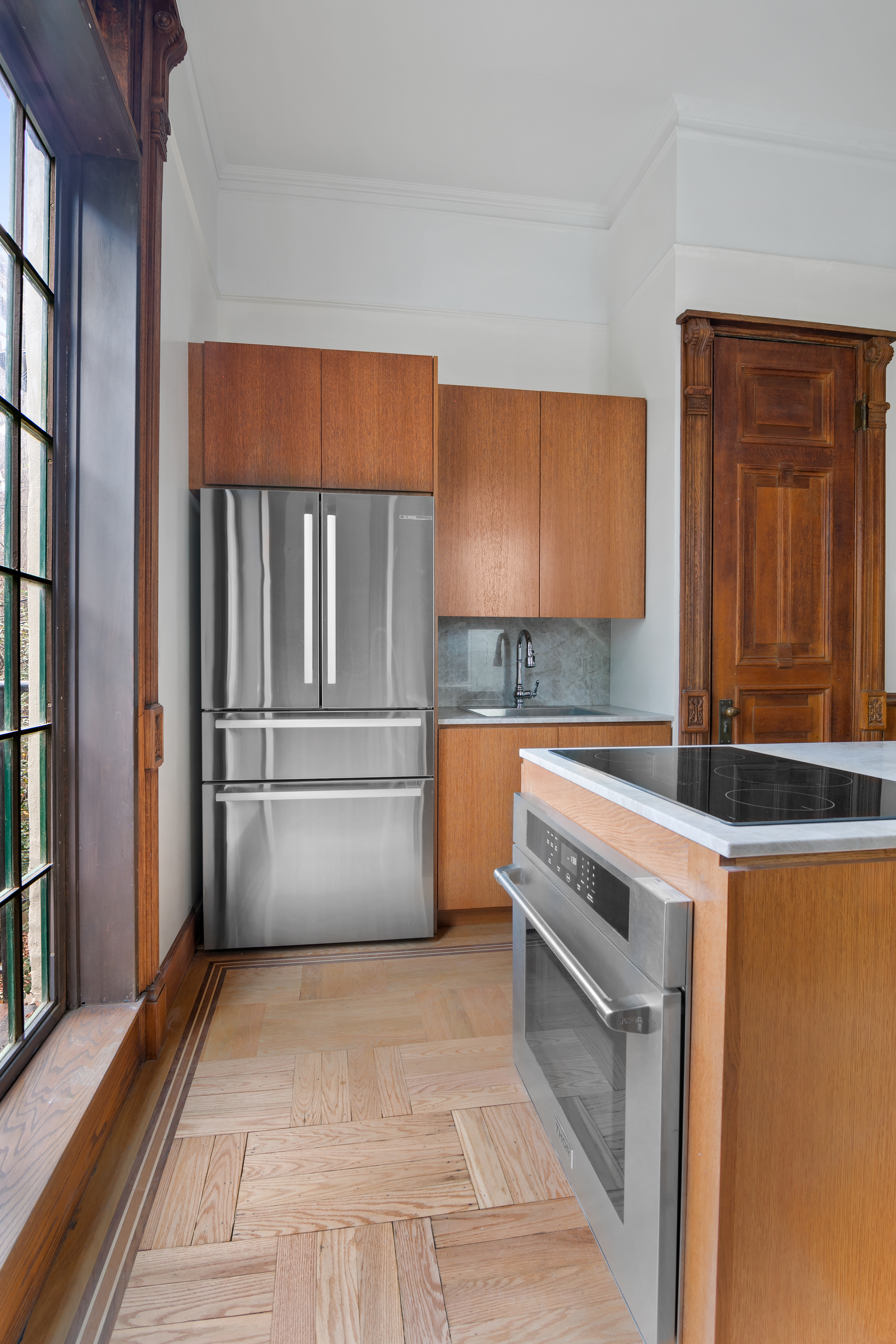 914 President Street, Unit TWNHSE Brooklyn, NY 11215 - Photo 8 of 29 a kitchen with granite countertop a refrigerator and a sink