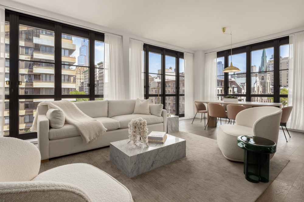 250 West 96th Street, Unit 7D Manhattan, NY 10025 - Photo 1 of 28 a living room with furniture and large windows