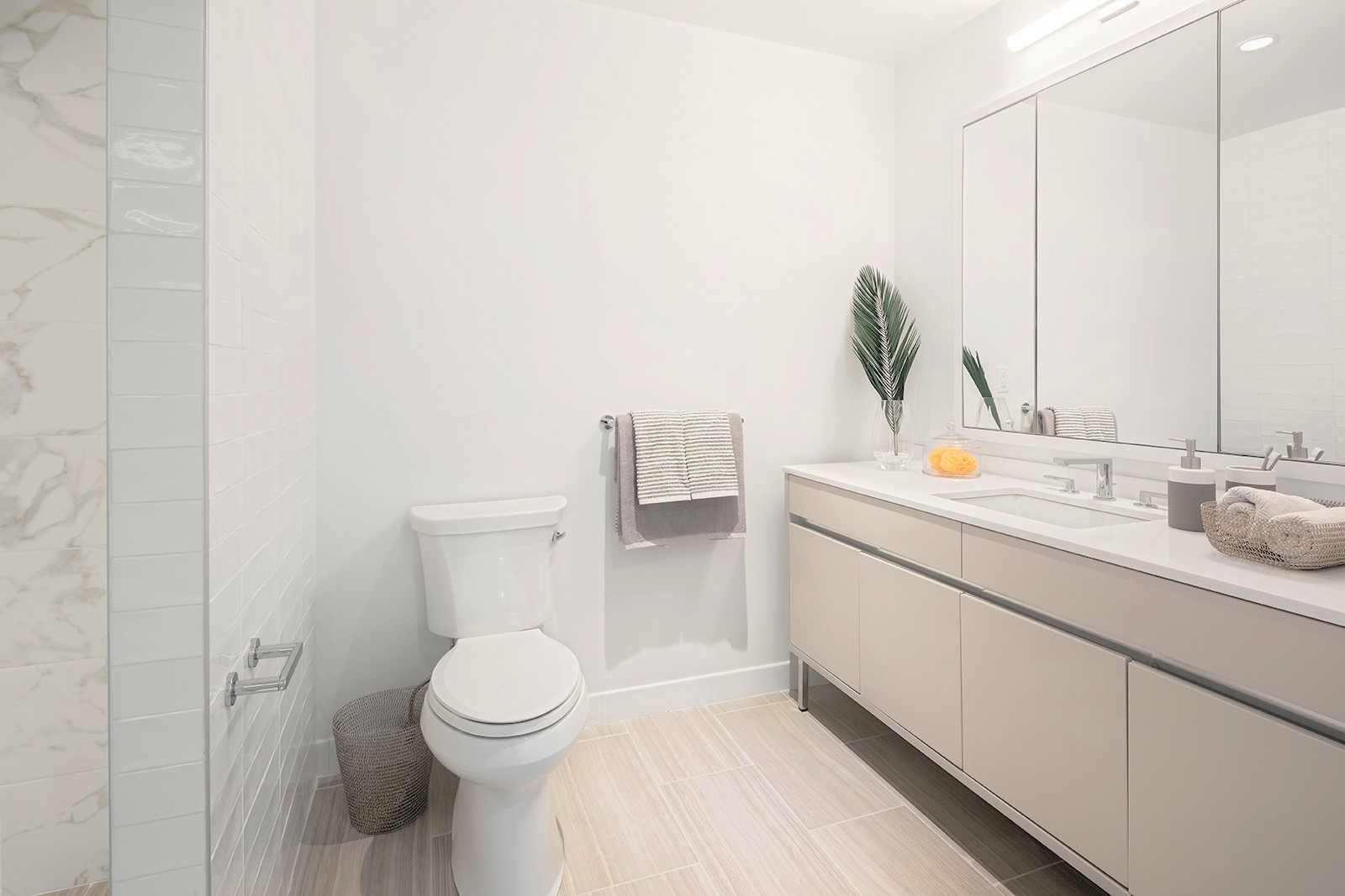 146 Pierrepont Street, Unit 2C Brooklyn, NY 11201 - Photo 6 of 30 a bathroom with a toilet sink and mirror