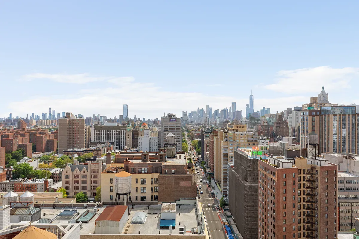 a view of a city with tall buildings
