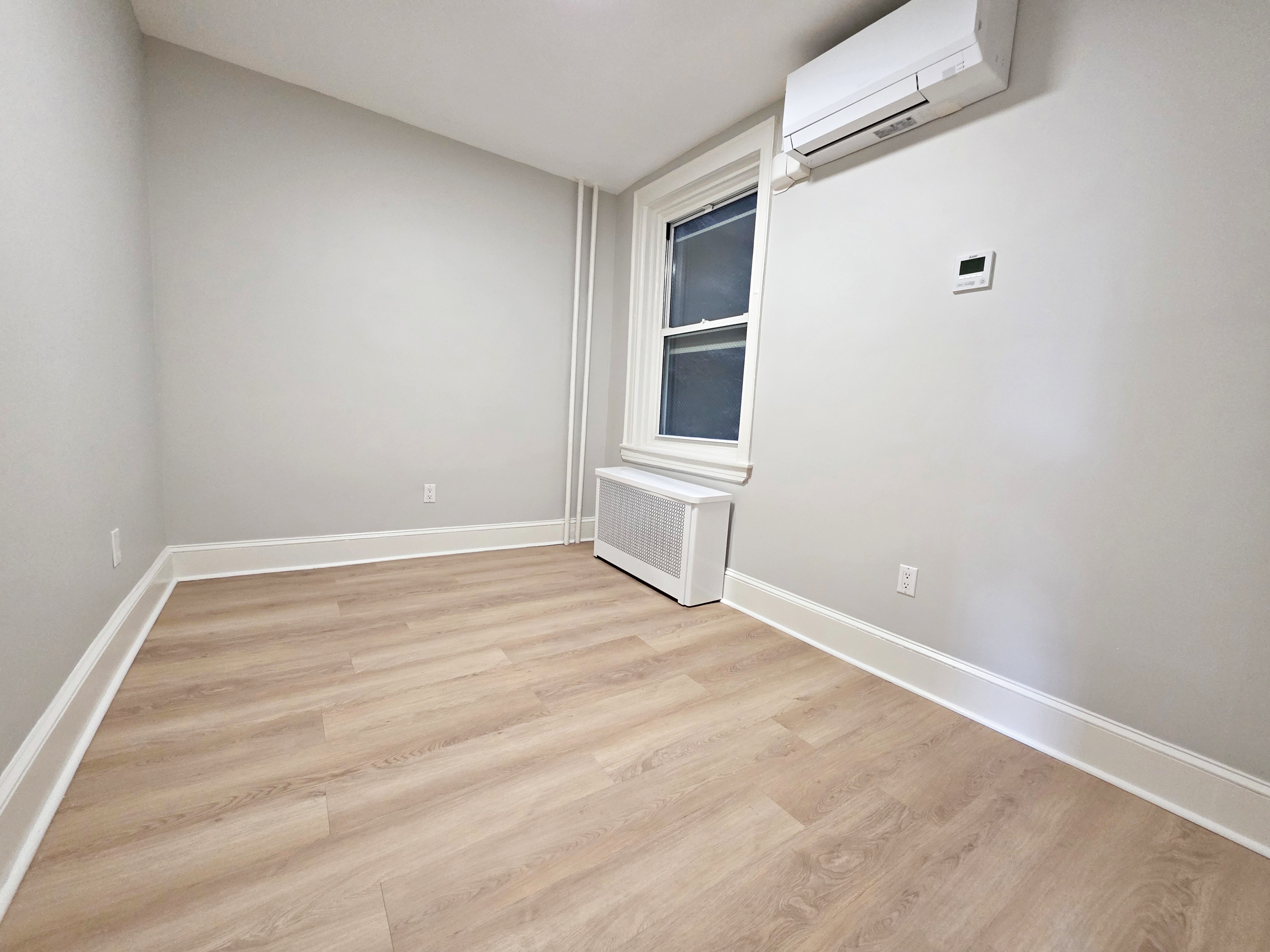 733 Metropolitan Avenue, Unit 3 Brooklyn, NY 11211 - Photo 11 of 13 a view of an empty room with a window