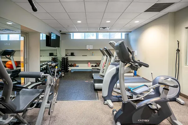 a view of a room with gym equipment