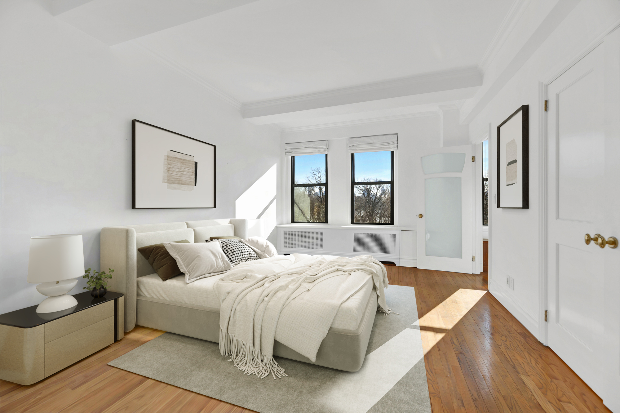 225 Central Park West, Unit 801 Manhattan, NY 10024 - Photo 11 of 21 a bedroom with a bed and a couch