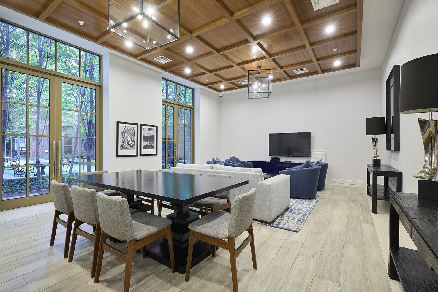 101 West 87th Street, Unit 205 Manhattan, NY 10024 - Photo 11 of 14 a view of a dining room with furniture a chandelier and wooden floor
