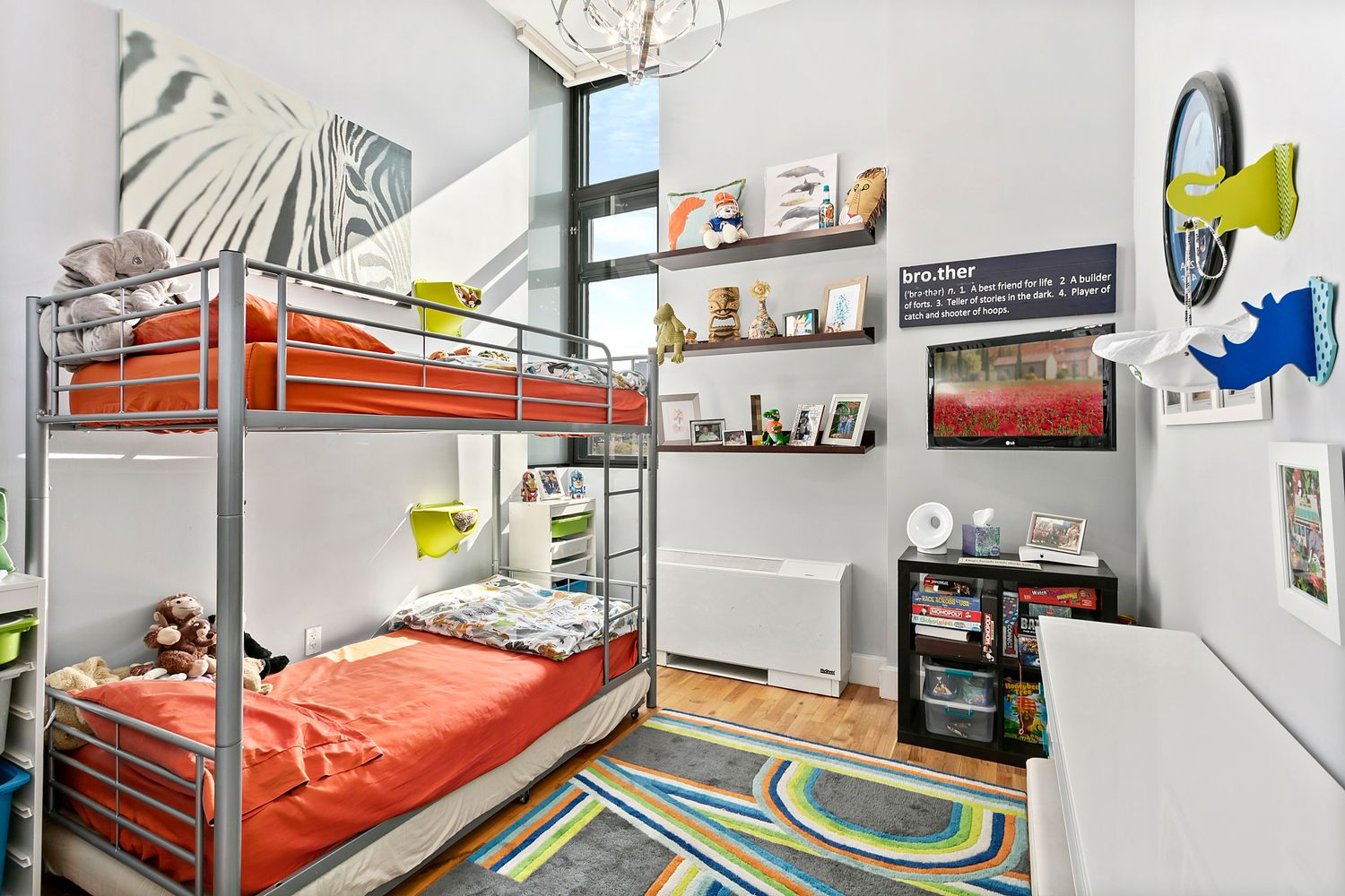 360 Furman Street, Unit 510 Brooklyn, NY 11201 - Photo 6 of 35 a bed room with a bed and a couch