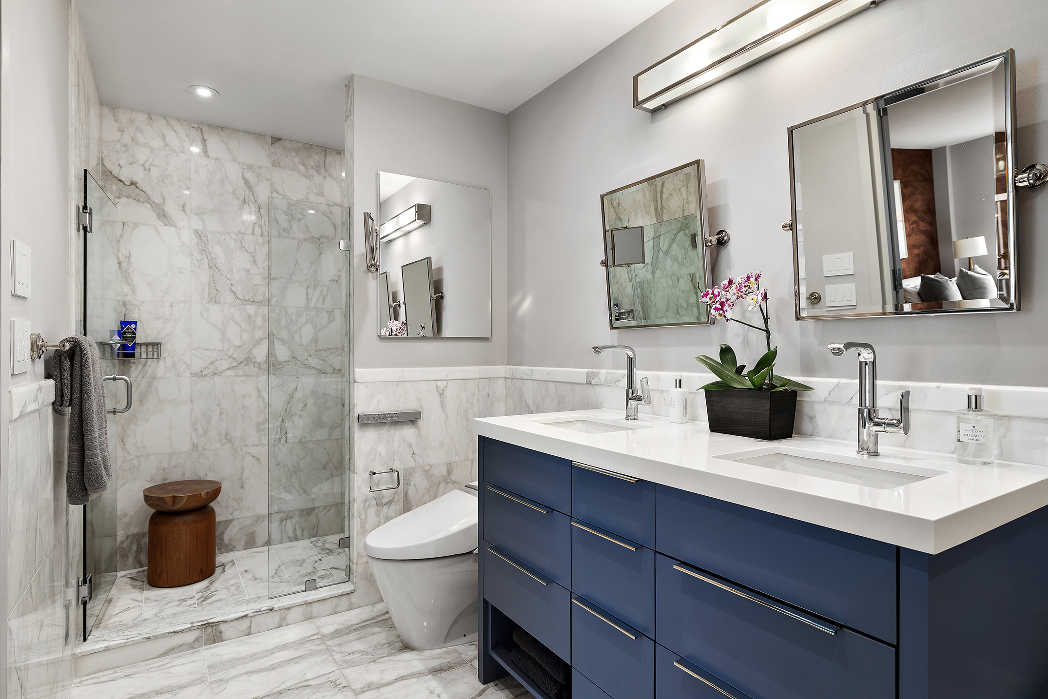 151 West 17th Street, Unit 4G Manhattan, NY 10011 - Photo 12 of 14 a bathroom with a sink a toilet and mirror