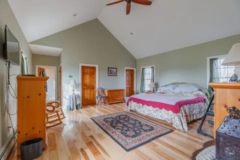 a view of a yard with an outdoor seating and garage