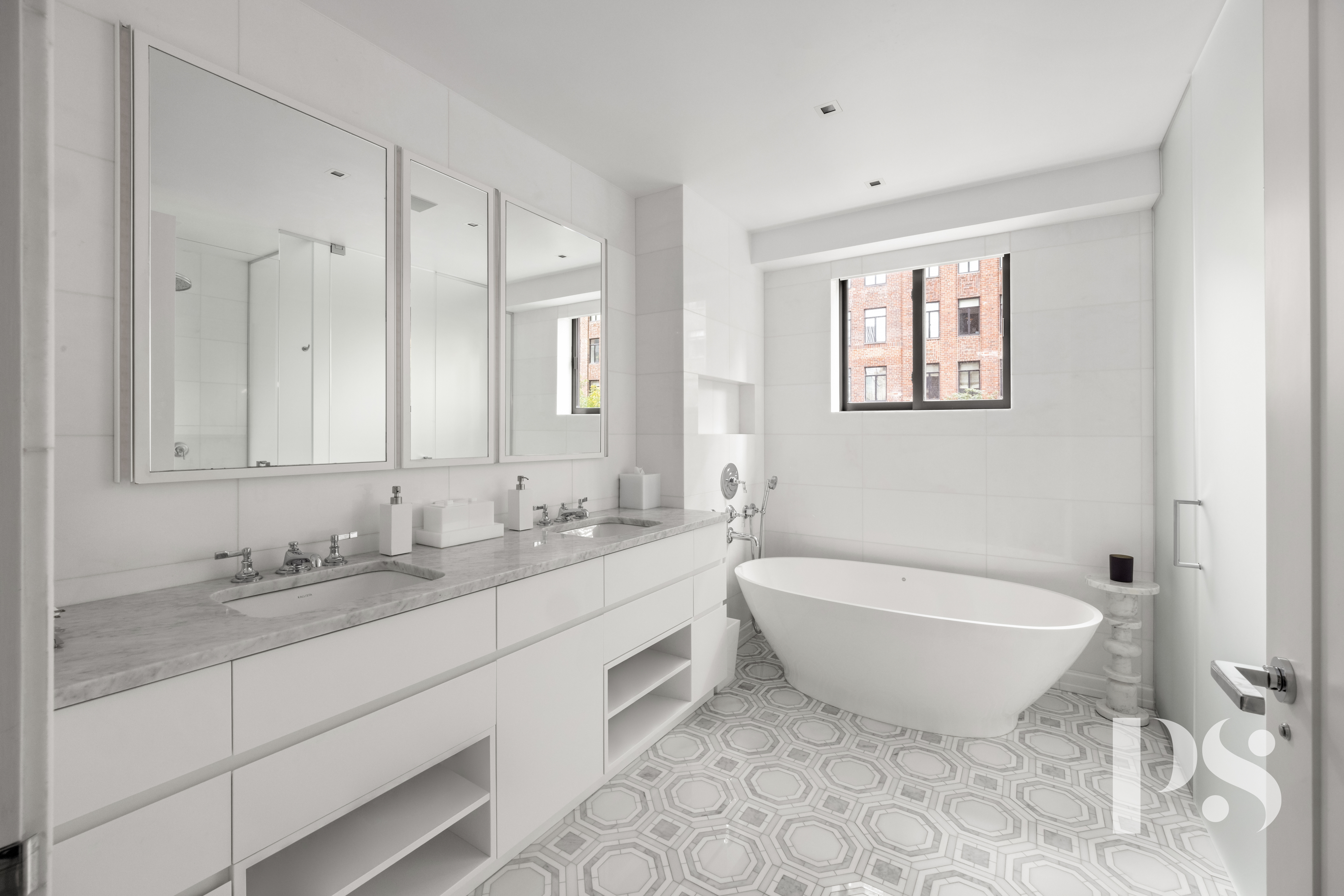 733 Park Avenue, Unit 4 Manhattan, NY 10021 - Photo 21 of 29 a spacious bathroom with a double vanity sink mirror and bathtub