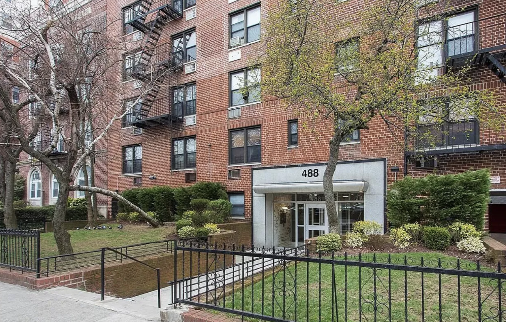 488 Ocean Parkway, Unit 3G Brooklyn, NY 11218 - Photo 7 of 8 front view of a house with a yard
