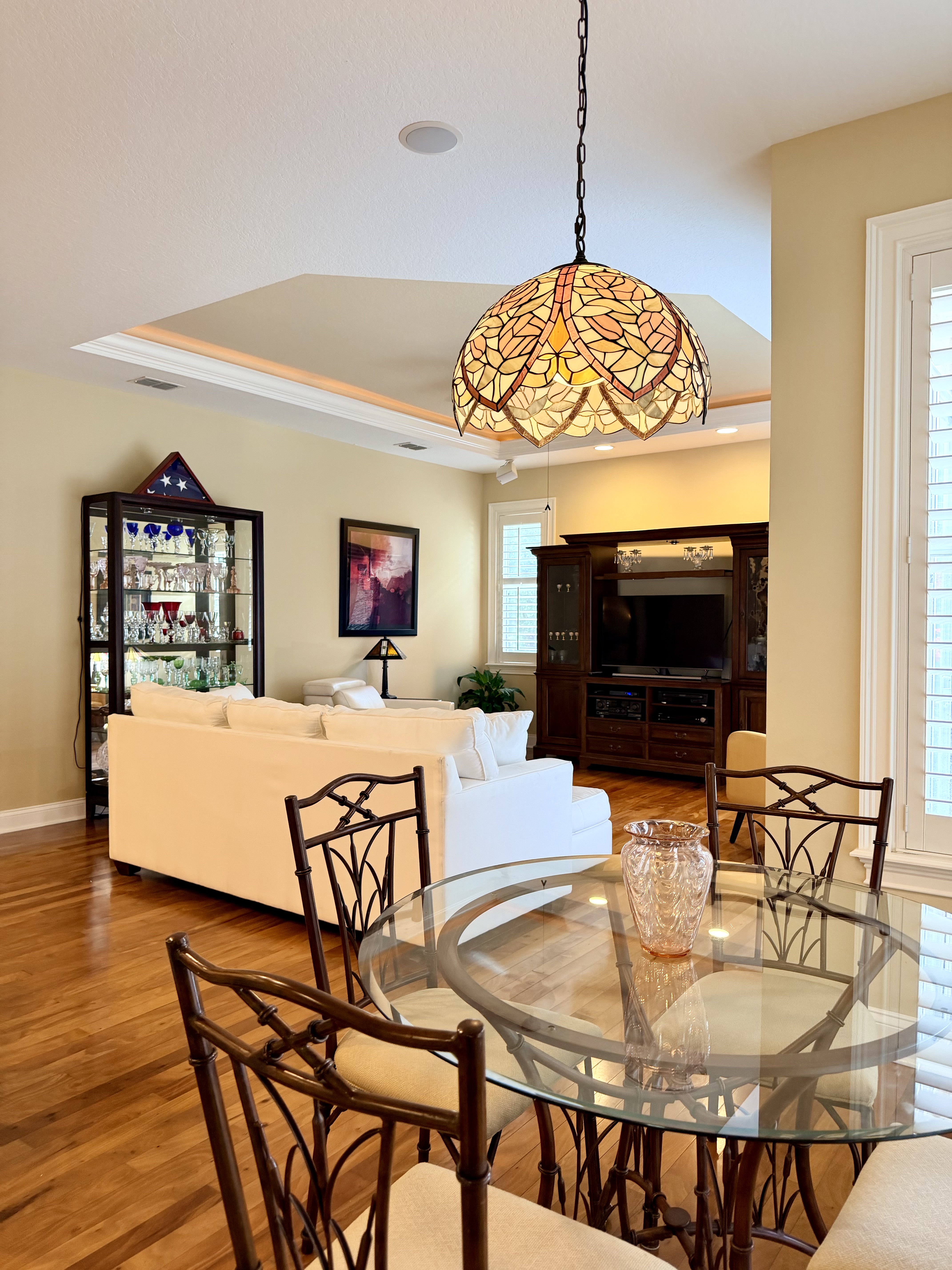 3196 Hawks Ridge Drive Lakeland, FL 33810 - Photo 5 of 14 a living room with furniture a flat screen tv and a fireplace
