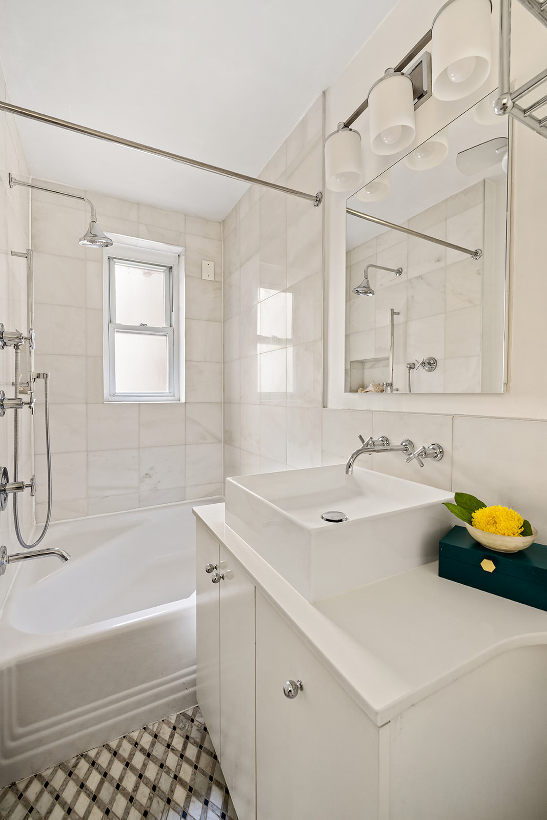 73 Columbia Heights, Unit C1 Brooklyn, NY 11201 - Photo 11 of 14 a bathroom with a tub sink and mirror