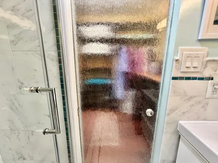 a bathroom with a sink a toilet and vanity