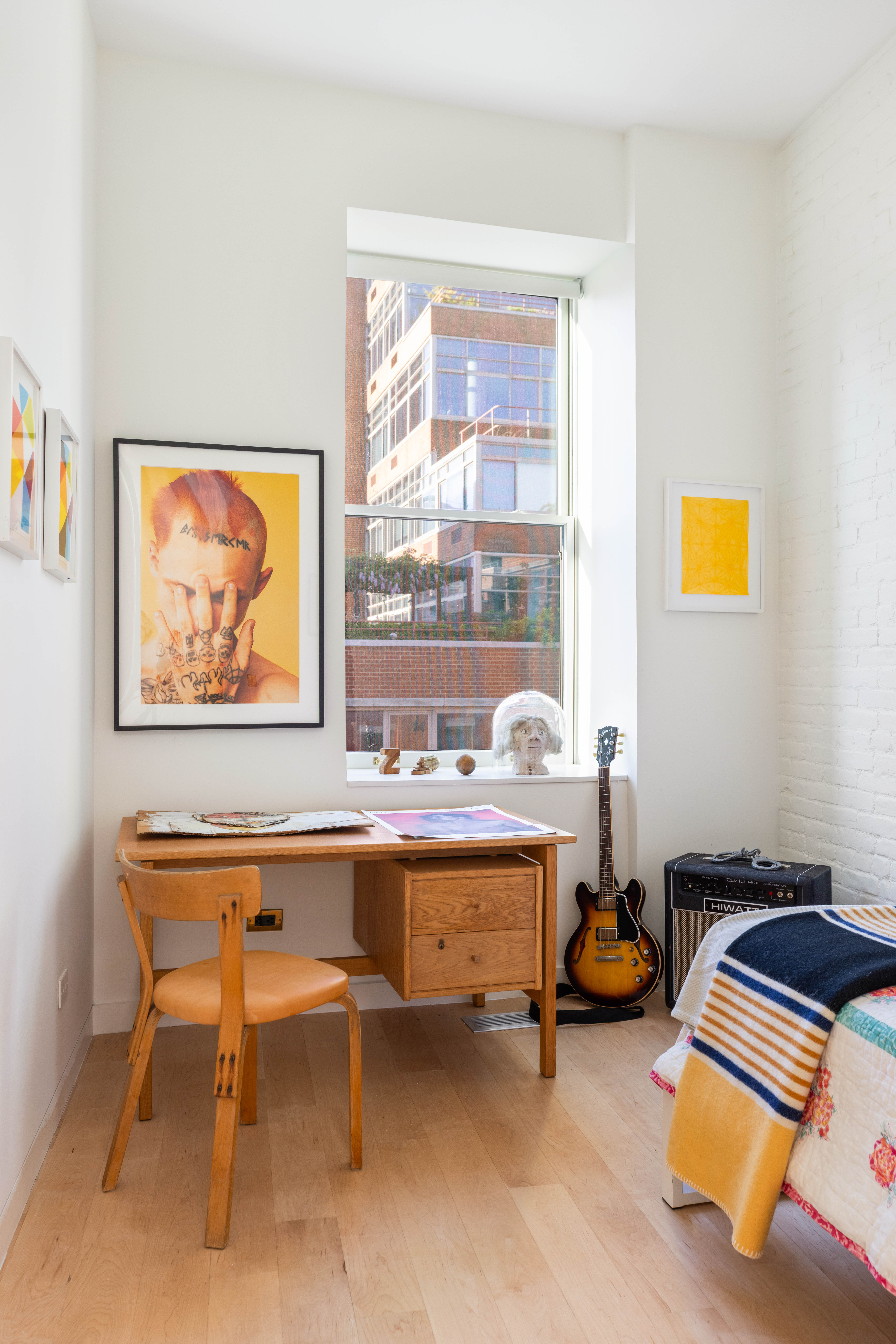 130 Jane Street, Unit 5/6F Manhattan, NY 10014 - Photo 18 of 23 a room with furniture and a window