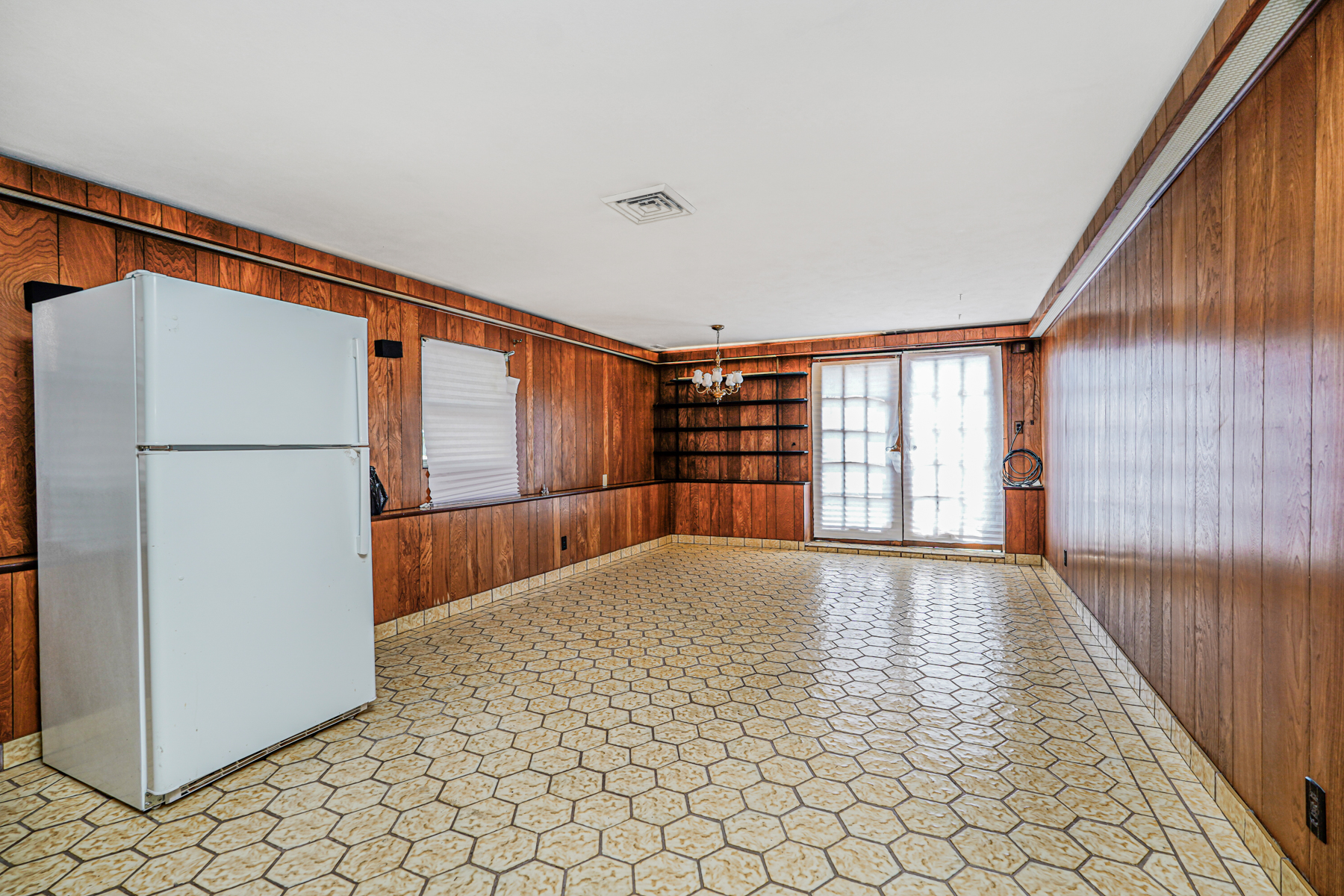 461 Mayfair Drive South Brooklyn, NY 11234 - Photo 22 of 30 a view of an empty room with a window