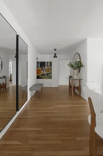 a view of a living room and dining room