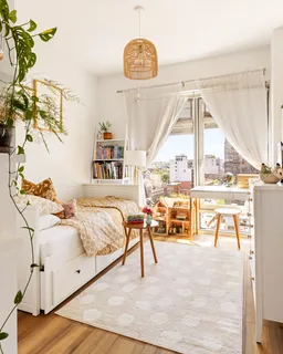 a bedroom with furniture and large windows
