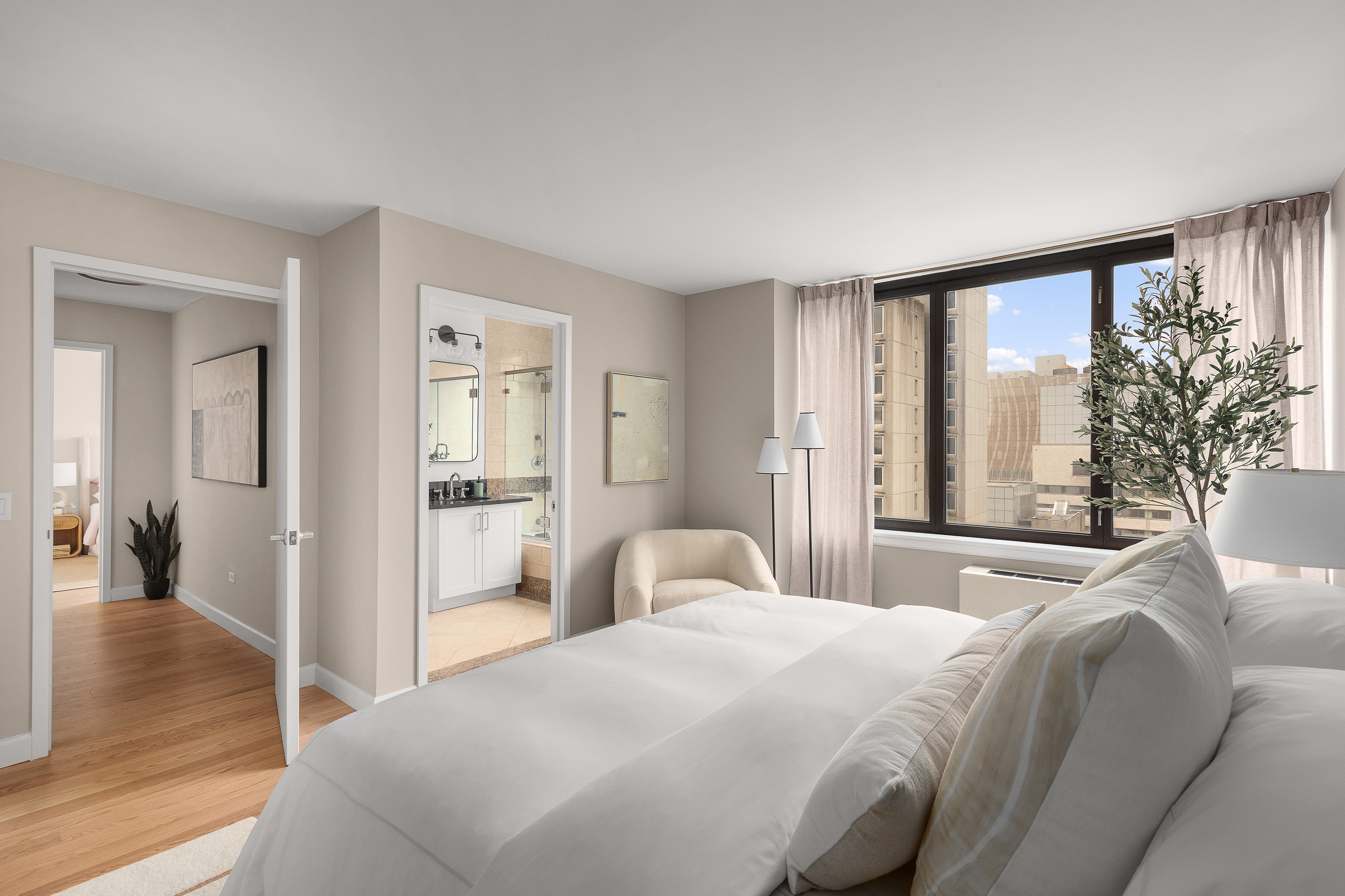 422 East 72nd Street, Unit 27C Manhattan, NY 10021 - Photo 17 of 25 a bedroom with a large bed and a large window