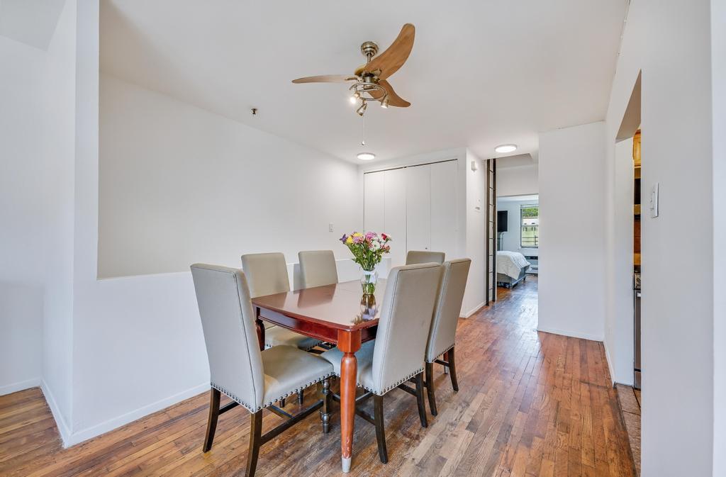 57 Carroll Street, Unit 38A Brooklyn, NY 11231 - Photo 13 of 21 a view of a dining room with furniture and wooden floor