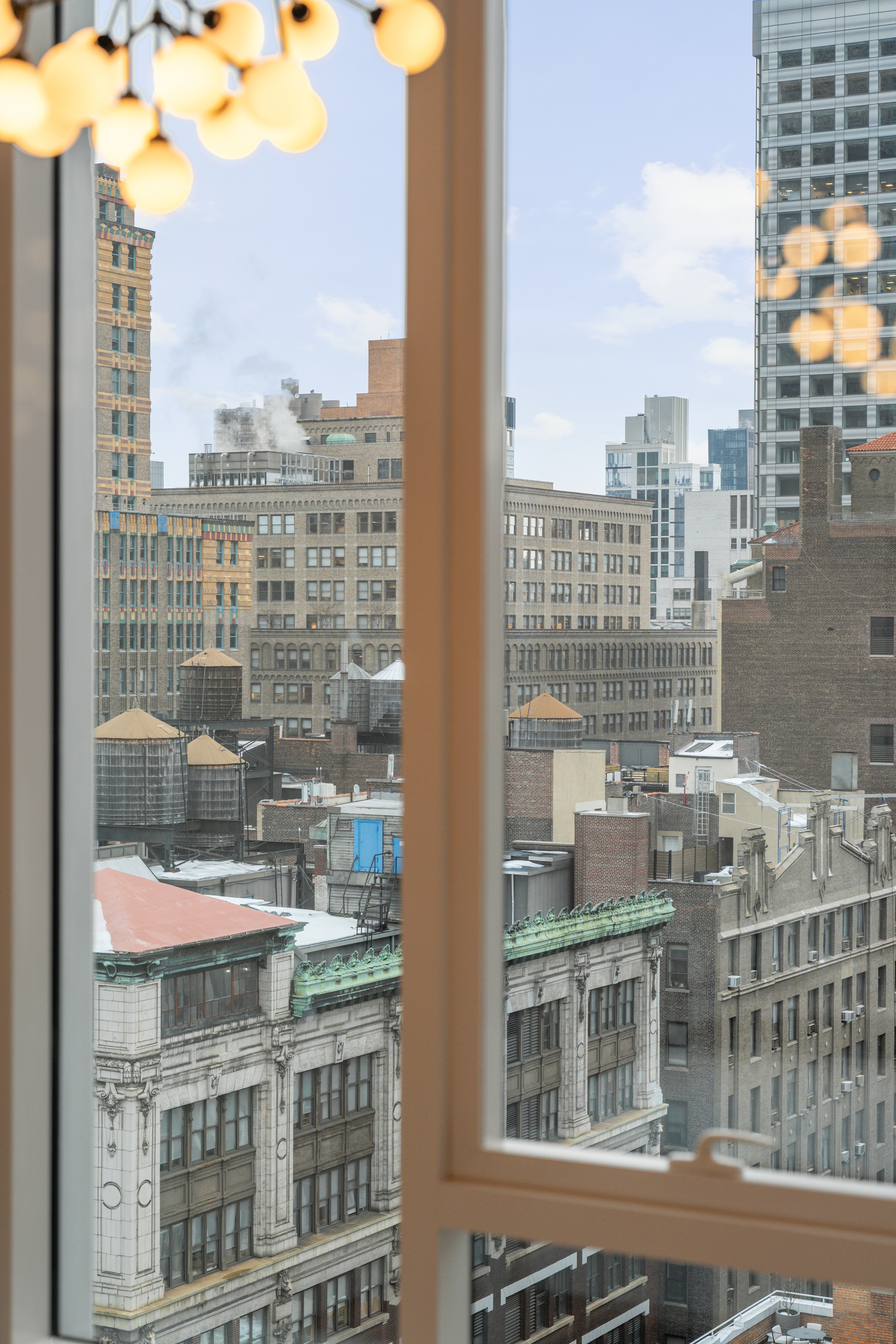 15 East 30th Street, Unit 19B Manhattan, NY 10016 - Photo 5 of 40 a view of a city that has tall buildings