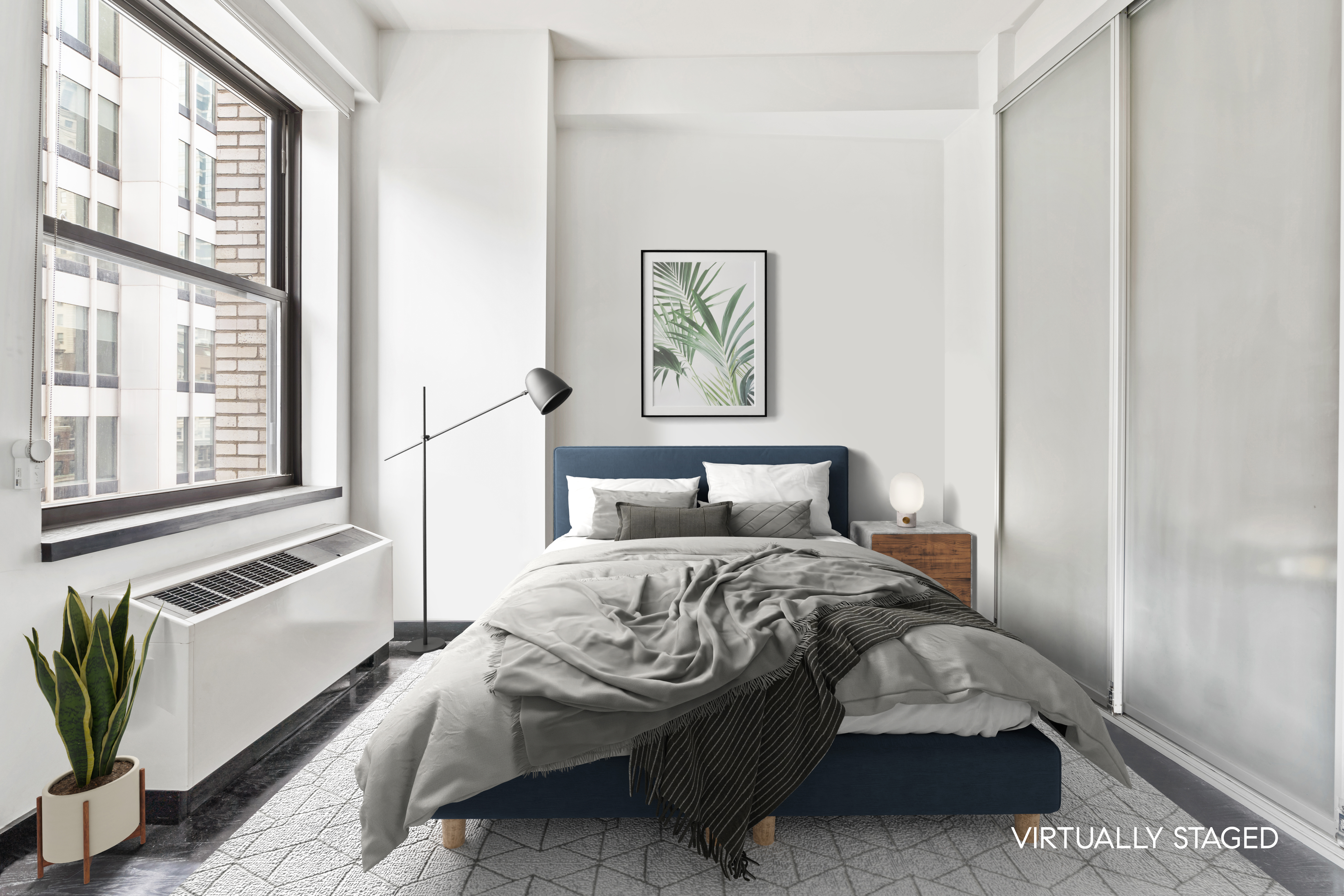 20 Pine Street, Unit 2012 Manhattan, NY 10005 - Photo 5 of 25 a bedroom with a bed and a window with chair